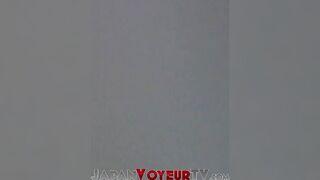 Young Japanese babe filmed fingering pussy in secret