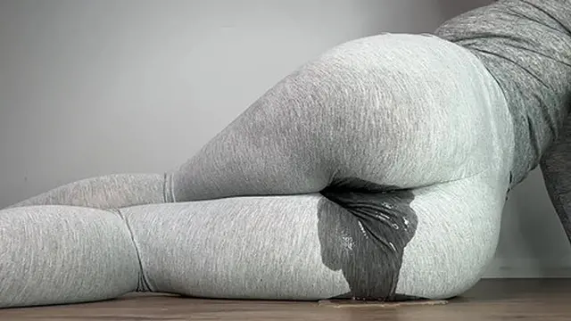 Grey leggings soaked with multiple wet marks from all-day rewetting