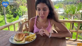 Cute Girl Eating Burger with Cum on Her Face in Public Cafe
