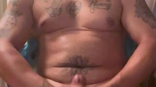 Tatted up beefy hunk jerking off to female fan and cumming for her