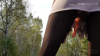 Walking in the park without panties in a mini dress and showing pussy