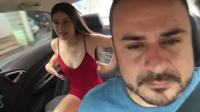 seductive student undresses by the vehicle