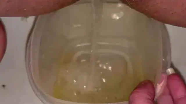 Girl Does Close Up Piss In Tupperware Container