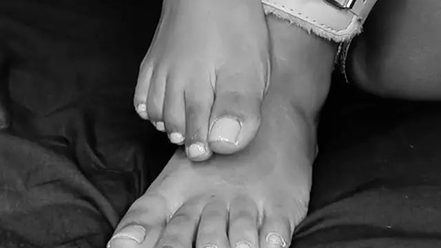Handcuffs on ankles &mdash;  bare feet