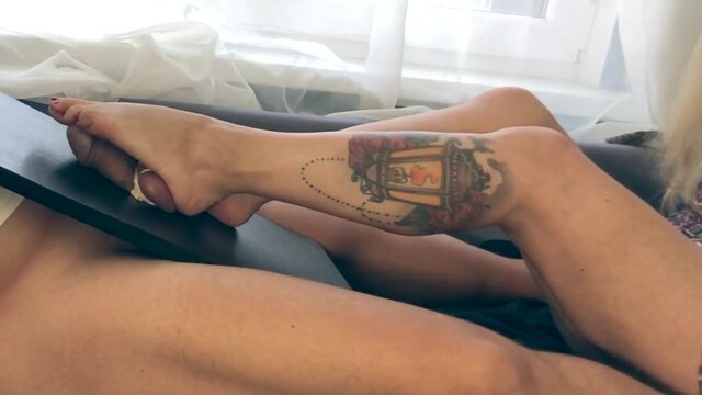 Alluring feet crushes balls in dominant footjob